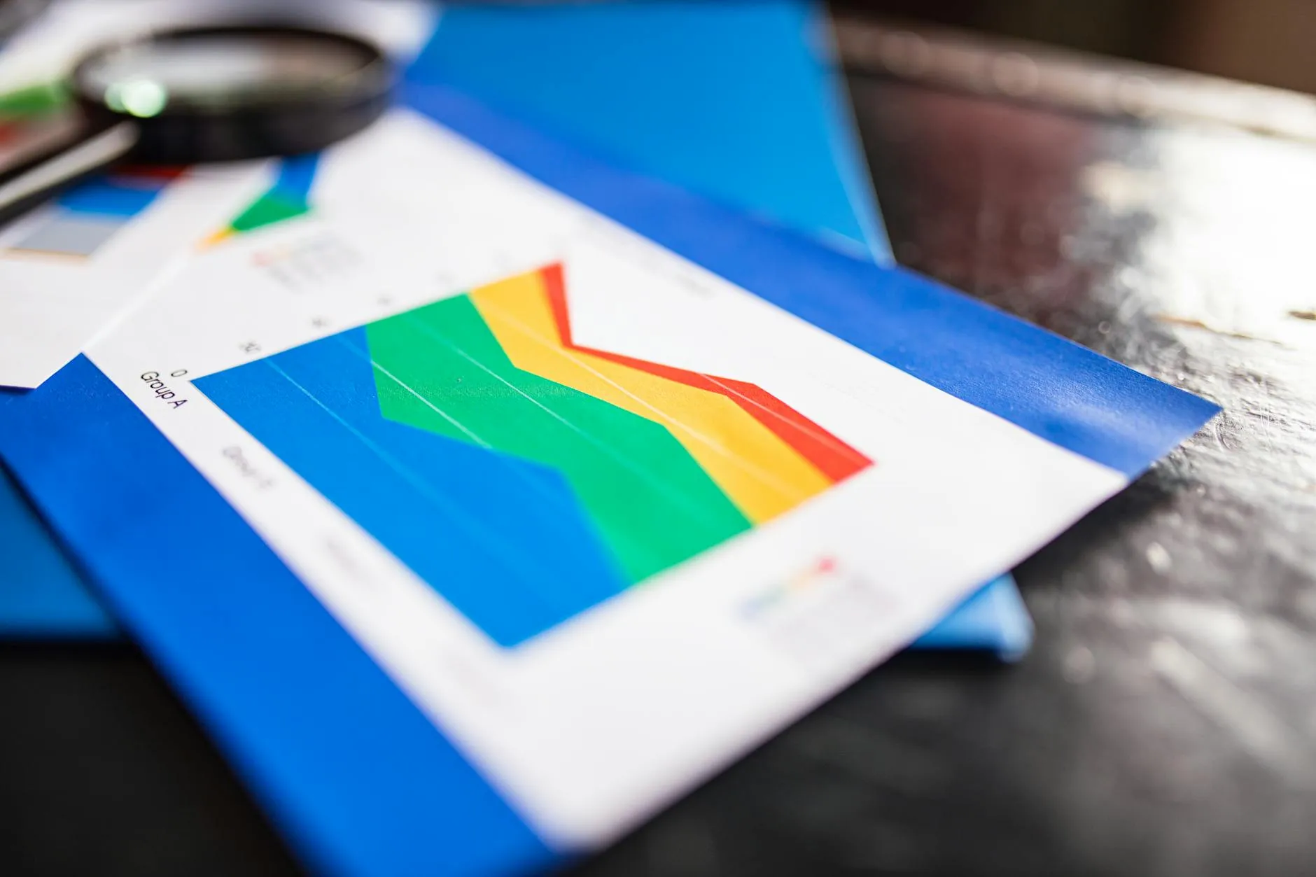 Close-up of a colorful chart on printed documents