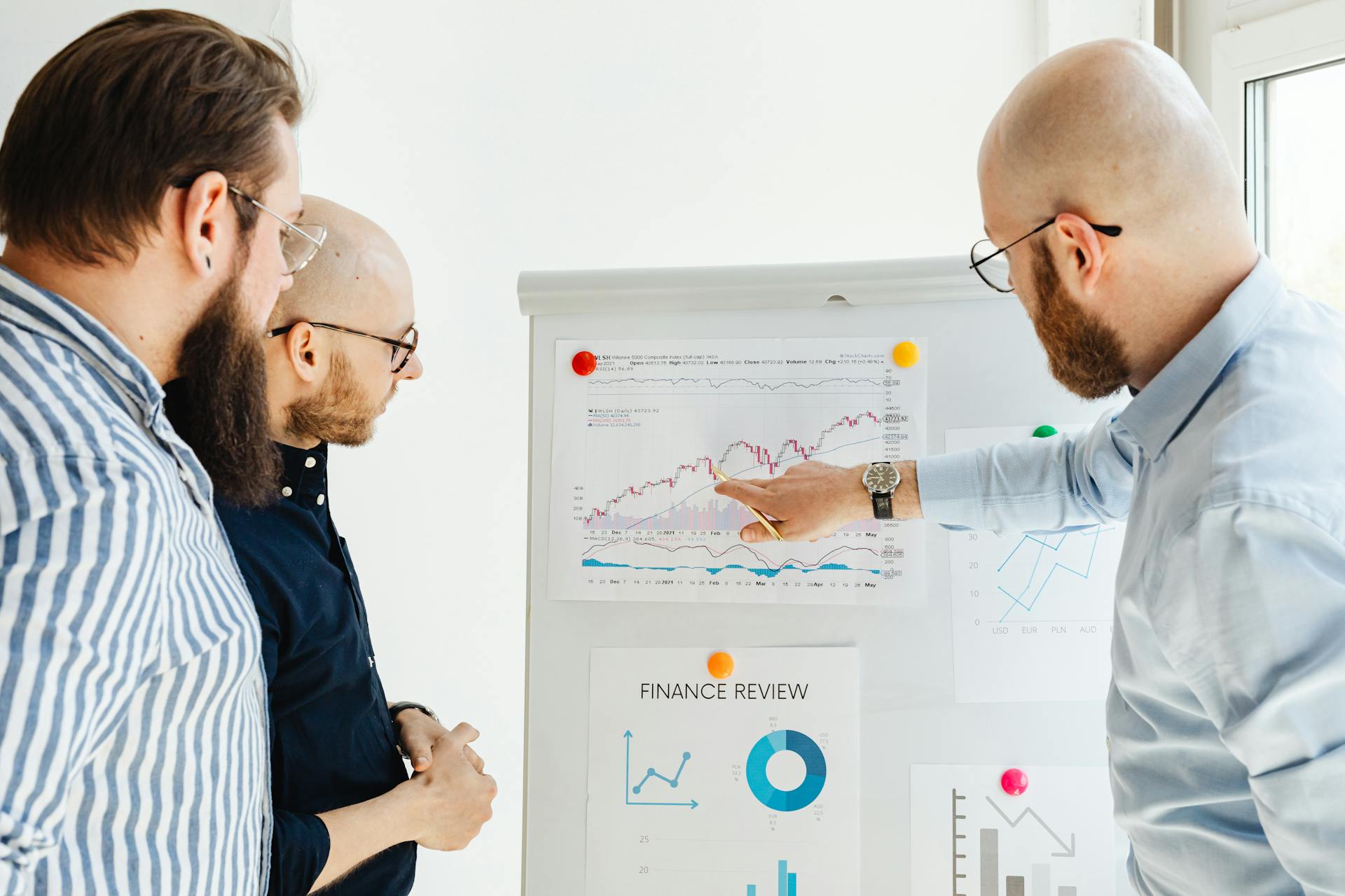 Professionals reviewing financial documentation